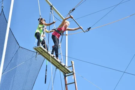 Girl swinging on a trapeze